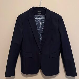 Beautiful navy two piece suit. Well made, beautifully lined with stretch lining